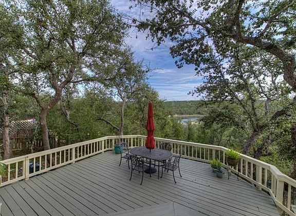 Enjoy the lakeviews to your boatdock over 2.6 acres to play from this large deck for fresco dining!
