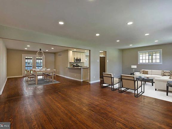 Front Entry view of Living Room and Dining Room (Staged)