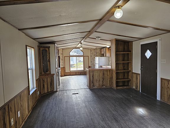 LIVING ROOM LEADING INTO KITCHEN