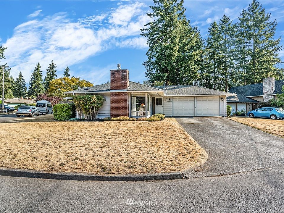 16502 NE 5th Street, Bellevue, WA. 98008 Is a mid-century rambler that has been owner by one family for over 60 years.  It is on a large corner lot that is 8,360 sq ft. 