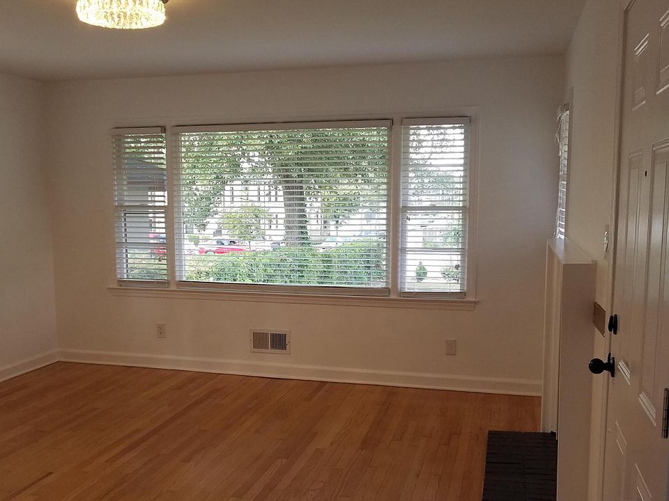 Living Room, Front Door, Lots of Natural Light, Picture Window, White Wood Blinds give Privacy when needed.