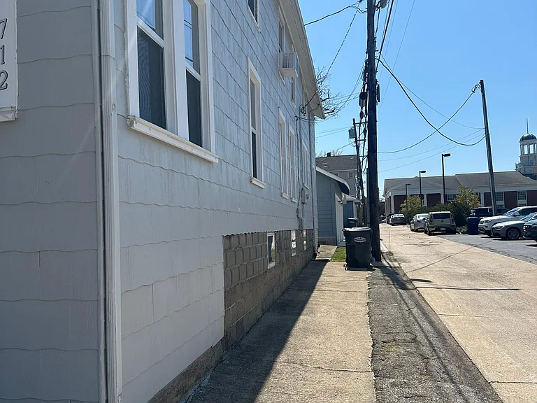 Right on the alley behind Insurance Management. One block off Main Street.
