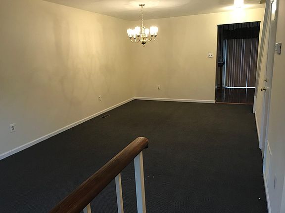 View from Entry of Open Living Room and Dining Area