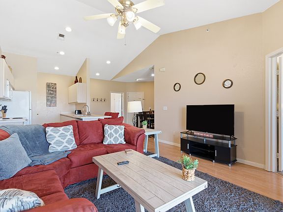 Fully furnished living area with 60in smart tv