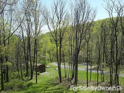 Kitchen/Dining Room
						:
						Open floor plan. Kitchen, dining, and living room are open and connected.
