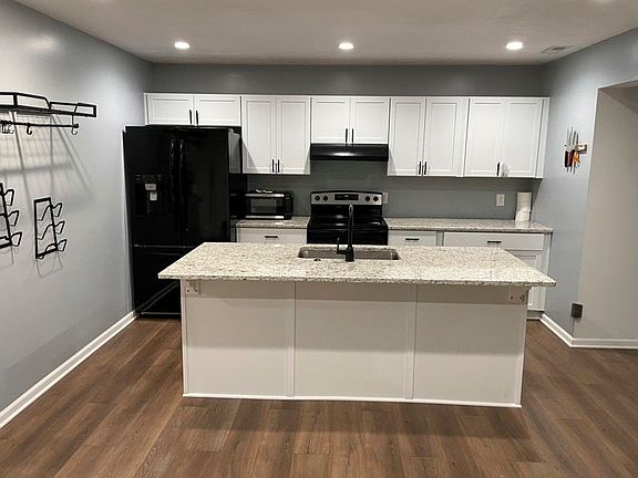 Includes refrigerator, oven, microwave, dishwasher, and garbage disposal.
