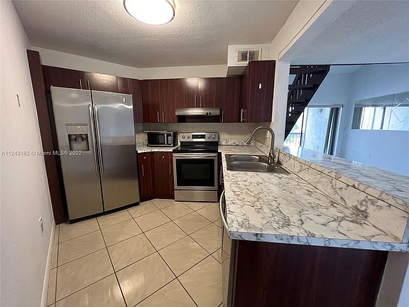 2nd image of 9419 NW Fontainebleau Blvd #203-28