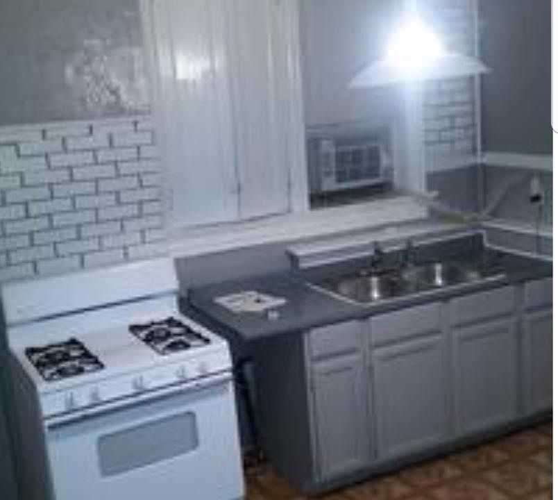 Kitchen, stove and refrigerator included