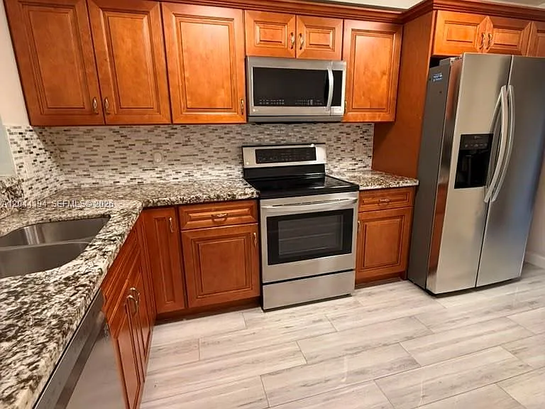 4182 S Pine Island Rd — Photo 2