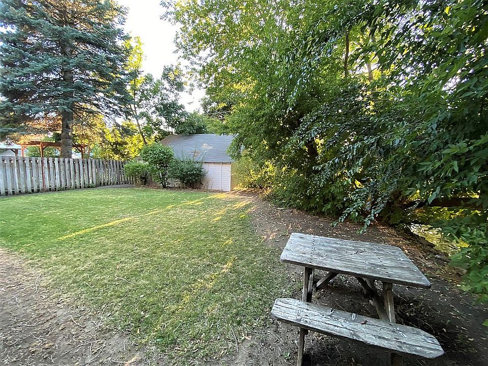 Back yard and storage garage