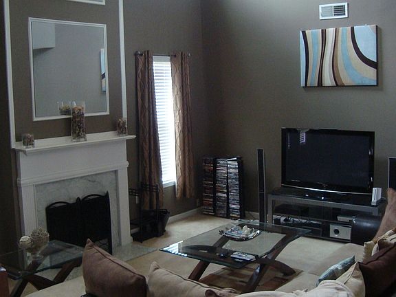 Sunken living room with glass fireplace