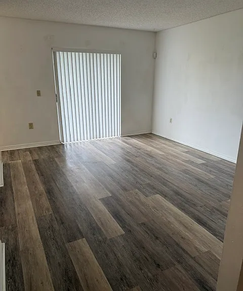 Living room with slide glass door to the porch