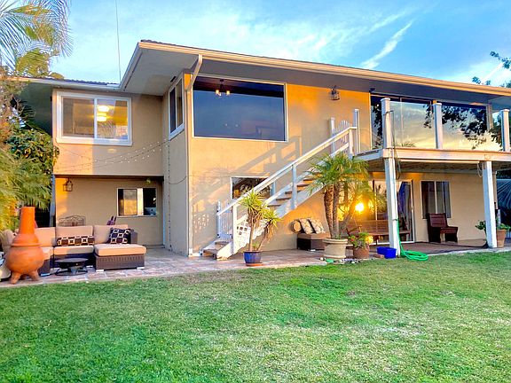 VIEW OF HOUSE FROM BACKYARD. ENTIRE BOTTOM LEVEL FOR RENT