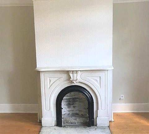 Faux Fireplace with Italian marble mantle in living room