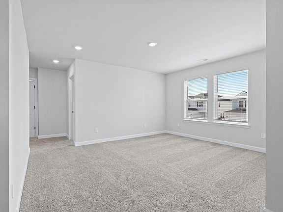 A second floor loft provides a large space to relax and unwind.