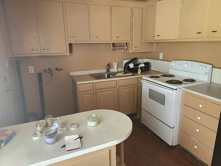 Kitchen with washer hook up on the left side.
