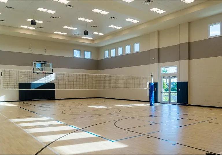 Volleyball Court. The indoor gymnasium features a volleyball and basketball court to enjoy year-round.