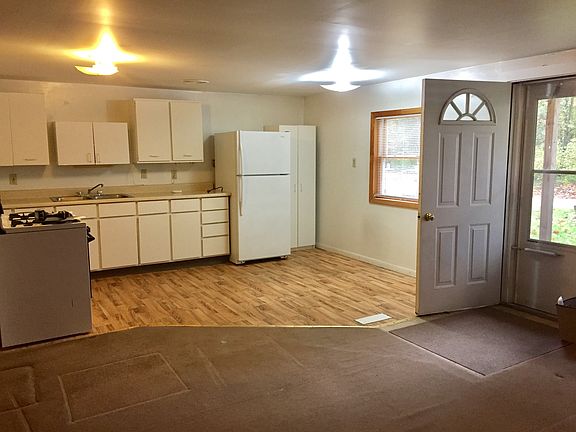 Open Living room looking into kitchen