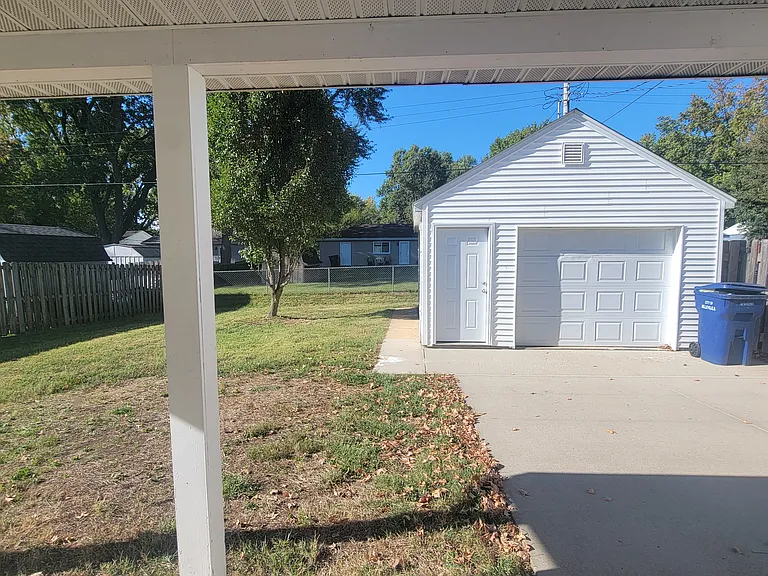 ONE CAR GARAGE & BACK PORCH AREA