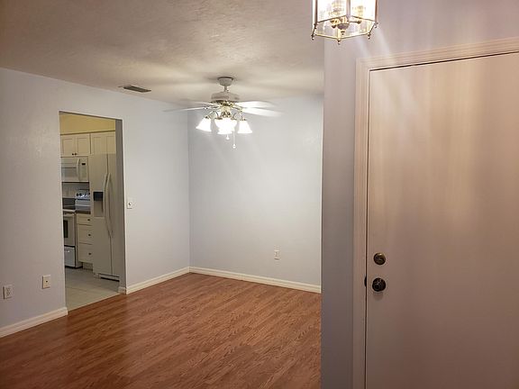 Dining Room. Entrance on right and kitchen doorway to the left.