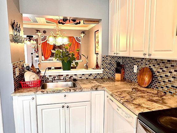 3rd image of 8708 Village Green Ct