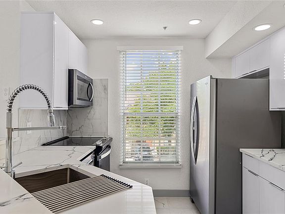 4th image of 6300 Raleigh St APT 115