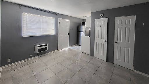 Facing the main entrance and bathroom, closet and kitchen