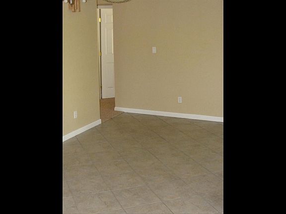Nook with tile floor just like the entry.