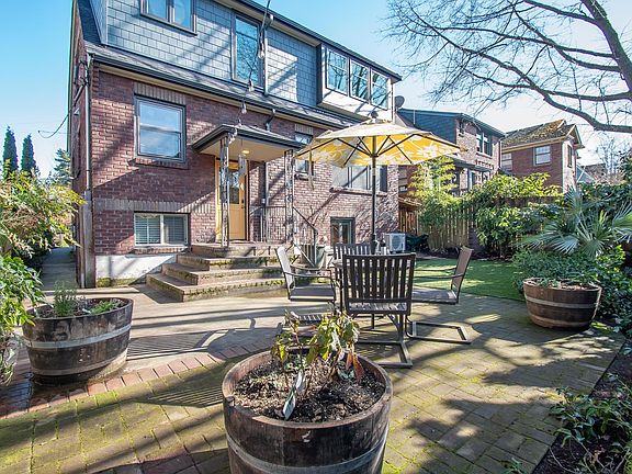 Apartment entrance is in the backyard garden