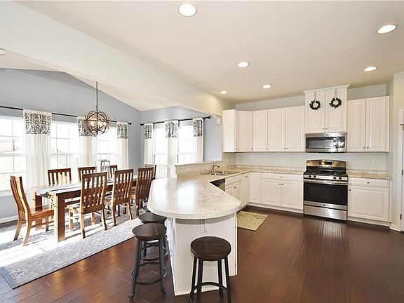 You will fall in love with the open great room concept and the enormous amount of space in this chef's kitchen.