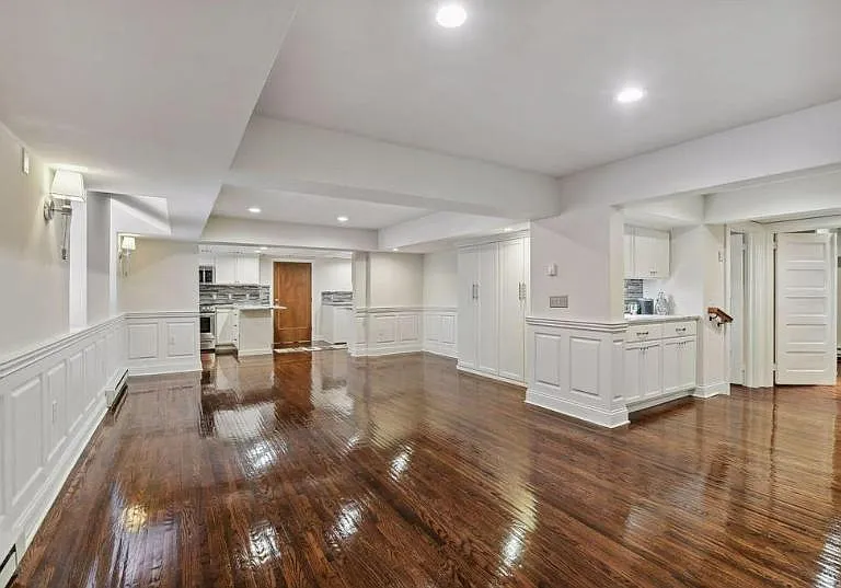 Extended space off family room and wet bar (right)