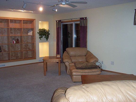 View of familyroom to patio and built ins