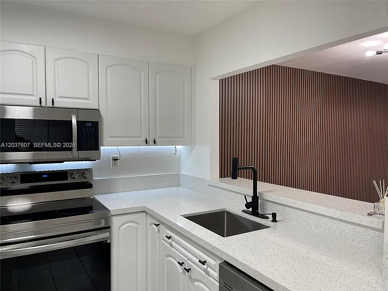 8233 Harding Ave #408 — Photo 4