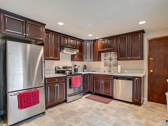 Stunning updates to the kitchen. Not shown is the slider to the multi-level deck (high end Trex material).