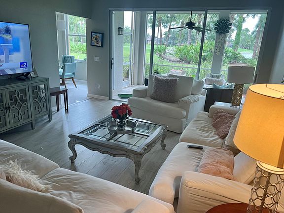 BIG living room with oversized chairs and couches