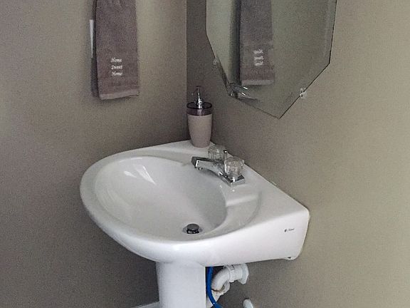 Half-bath pedestal sink