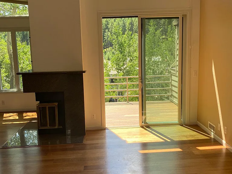 Dining area with patio door to deck