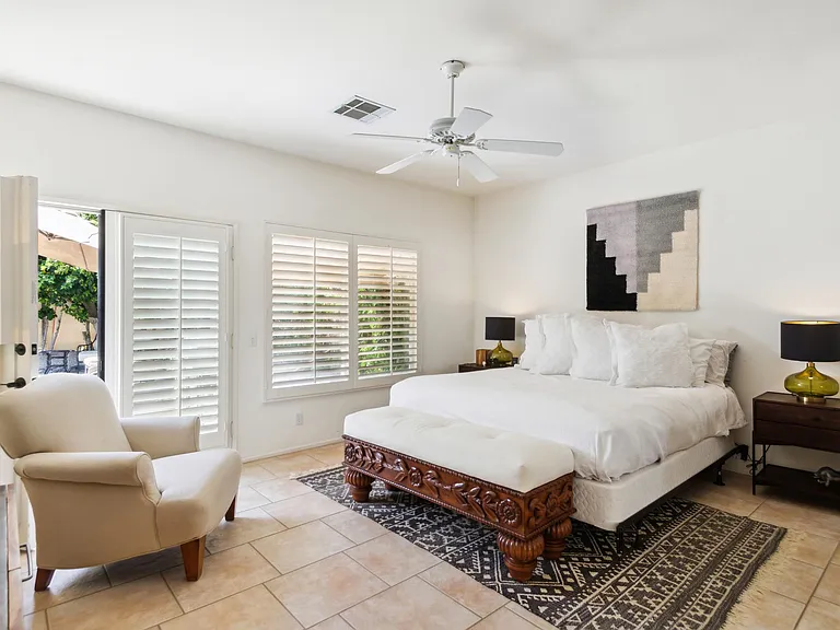 Master Bedroom - direct access to pool and on-suite full bath
