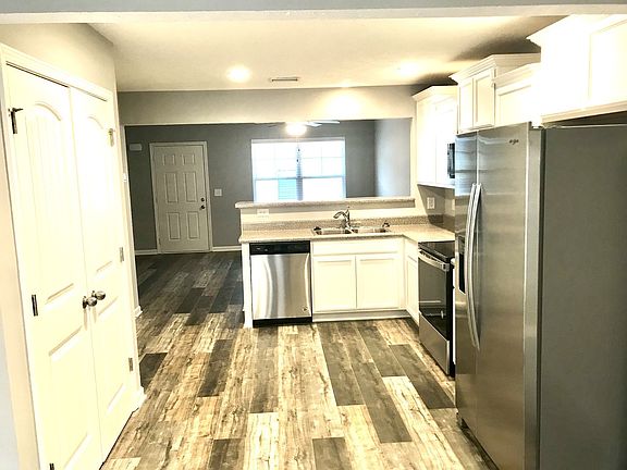 Kitchen featuring stainless appliance package and double pantry