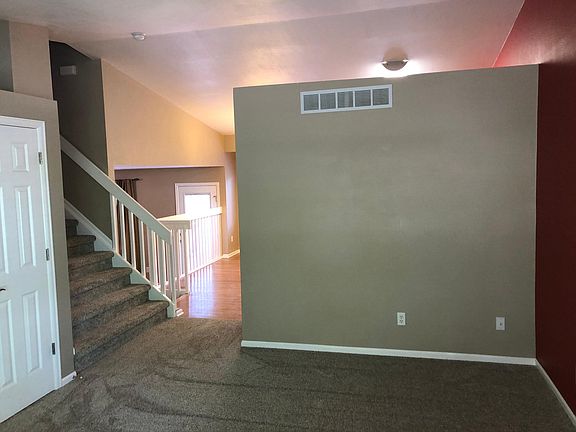 Living room looking into kitchen