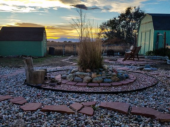 Backyard with 2 sheds