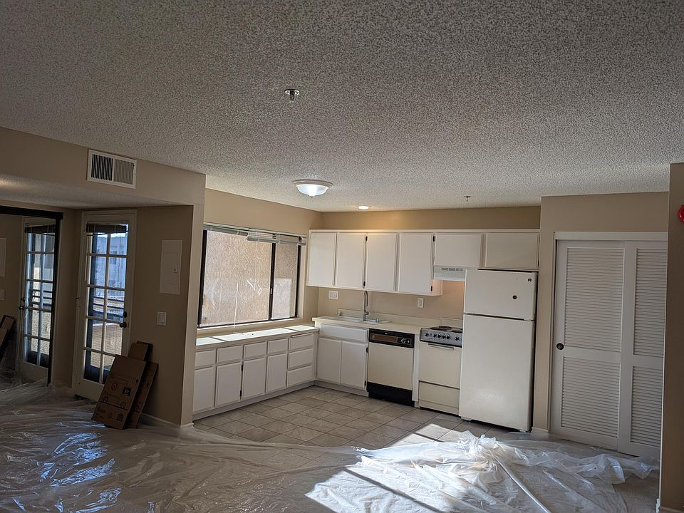 Kitchen area with tile floor