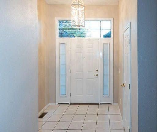 Beautiful entry with very high ceilings