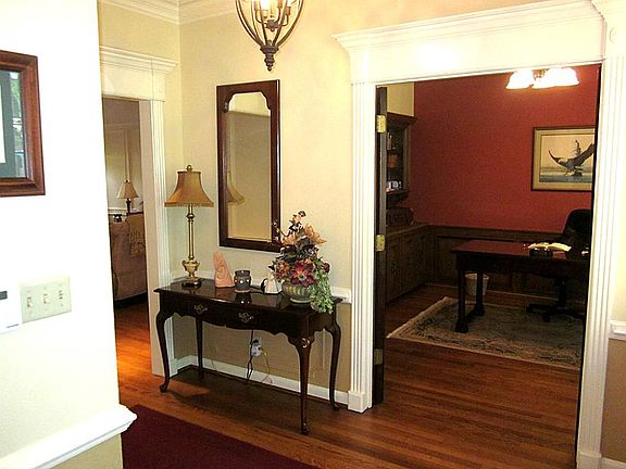 Entry hall is where the reclaimed oak hardwood floors begin