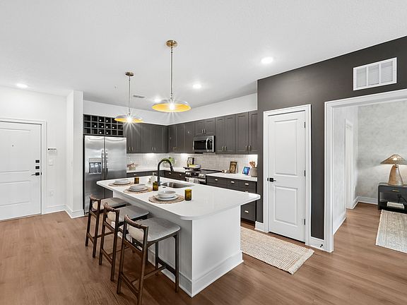 Kitchen with Quartz Countertop and Stainless Steel Appliances