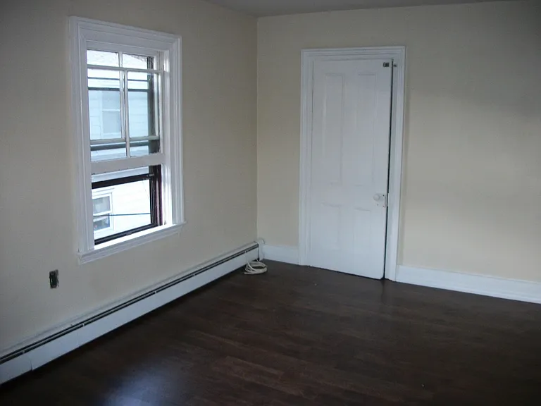 Bedroom looking towards the door to the large walk in closet