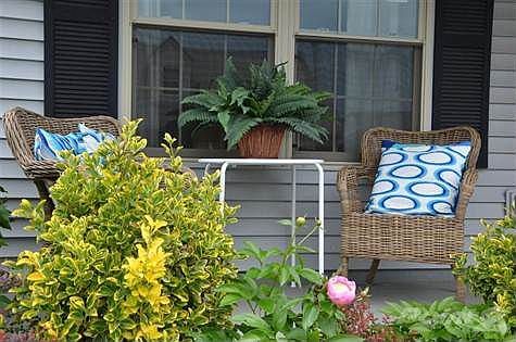 Retreat and have your morning coffee on your darling front porch.
