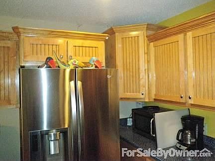 A beautiful stone fireplace...
						:
						...is the centerpiece of this get-away living room.