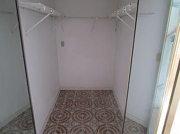 walk-in closet in master bedroom