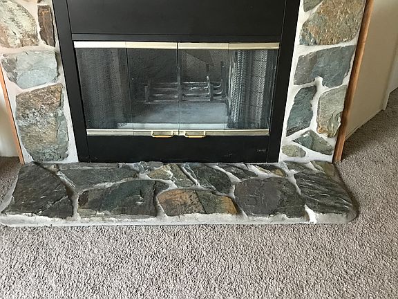 Fireplace facing living room